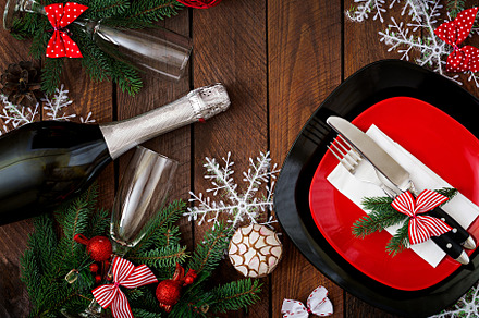 Christmas table containing christmas, setting, and table