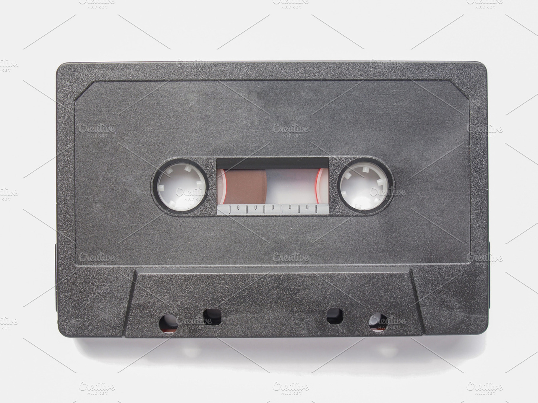 Cassette tape containing compact, cassette, and tape