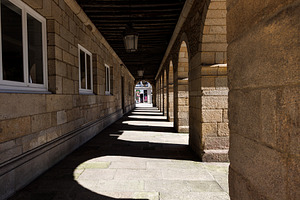 Historic stone arcades and traditional porticoes in old town Lugo Spain, an Architecture Photo by Bepslabor