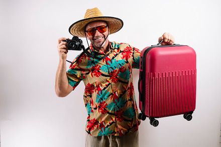 Smiling man ready for tropical vacation adventure