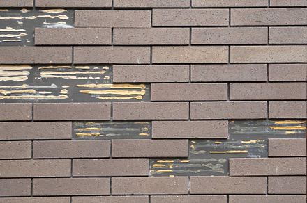 Red brick wall pattern surface texture. Close-up of interior mat, a Background Photo by Tampatra