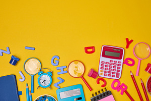 Colorful school supplies, learning items calculators, letters, t, a School & Education Photo by ndanko