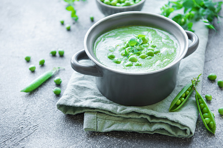Fresh vegetable soup made of green peas, a Food & Drink Photo by Olena Rudo