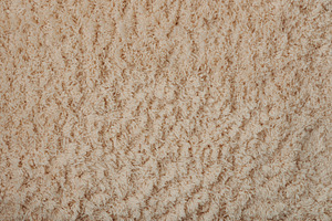 Texture of brown soft fluffy carpet