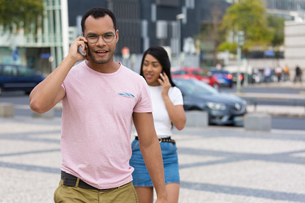 Smiling young man talking, a Person Photo by SurfsUpVector