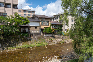 Traditional riverside houses along the Miyagawa River in Takayam, a Nature Photo by GoodGoods