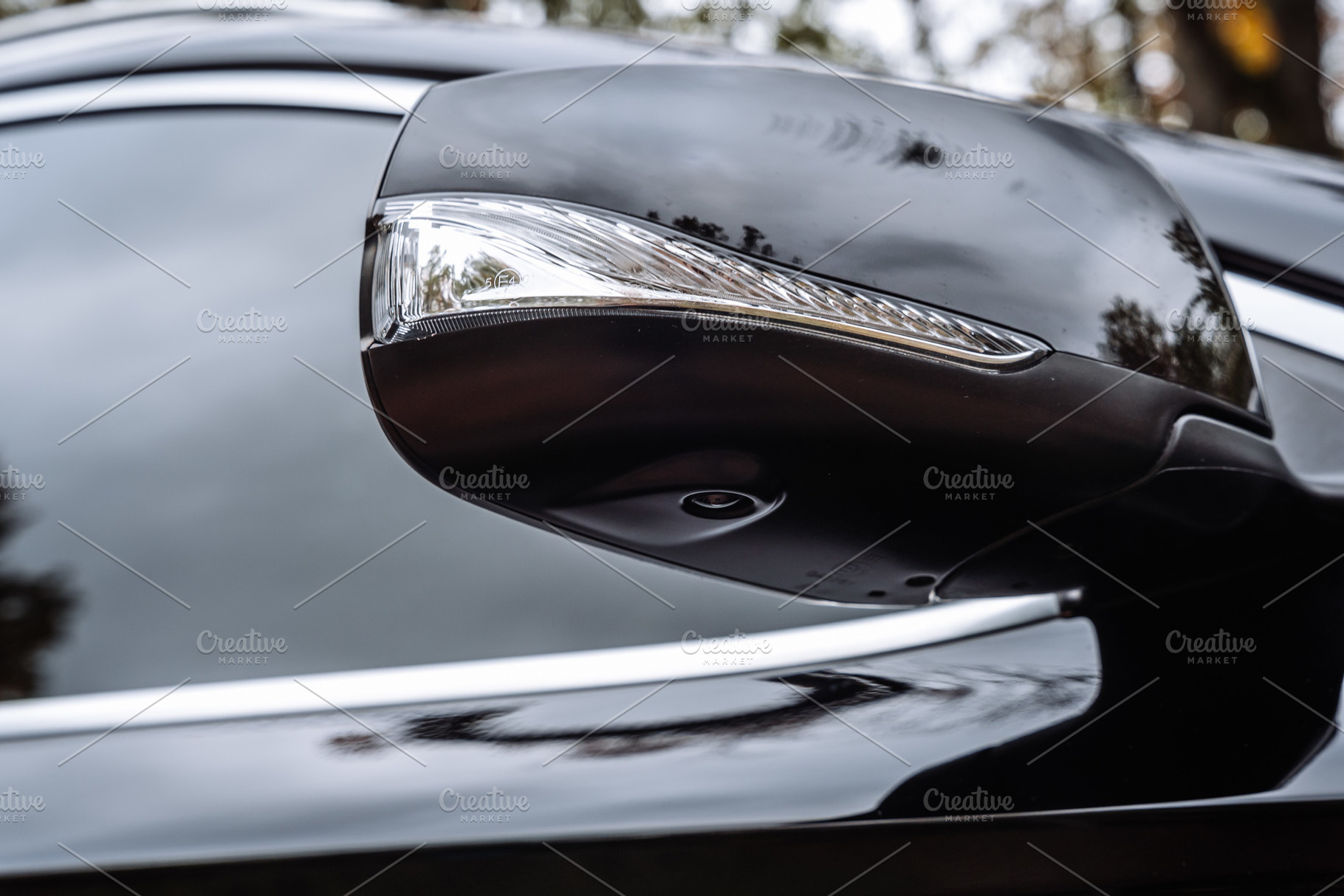 Car Side Mirror with Integrated Turn Signal Close Up, a Transportation Photo by Red Hot Chili Pepper Shop