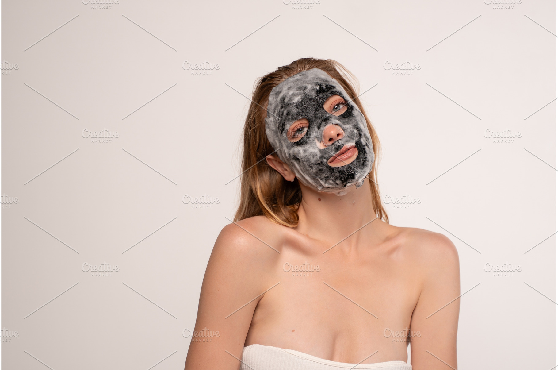 Woman enjoying a purifying charcoal, a Beauty & Fashion Photo by volodymyrshtun13795