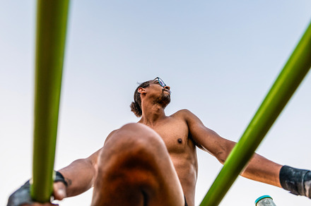 Man in calisthenics park seen from l, a Sports & Recreation Photo by Perpis