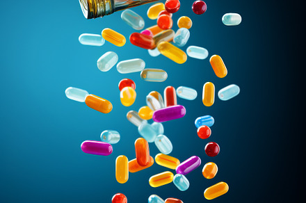 flying pill tablet capsule on blue background. levitation medicine., an Abstract Photo by Natalia Klenova's Shop