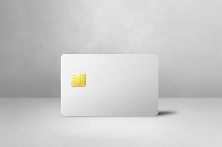 White credit card on a light concrete background, a Business Photo by GoodGoods