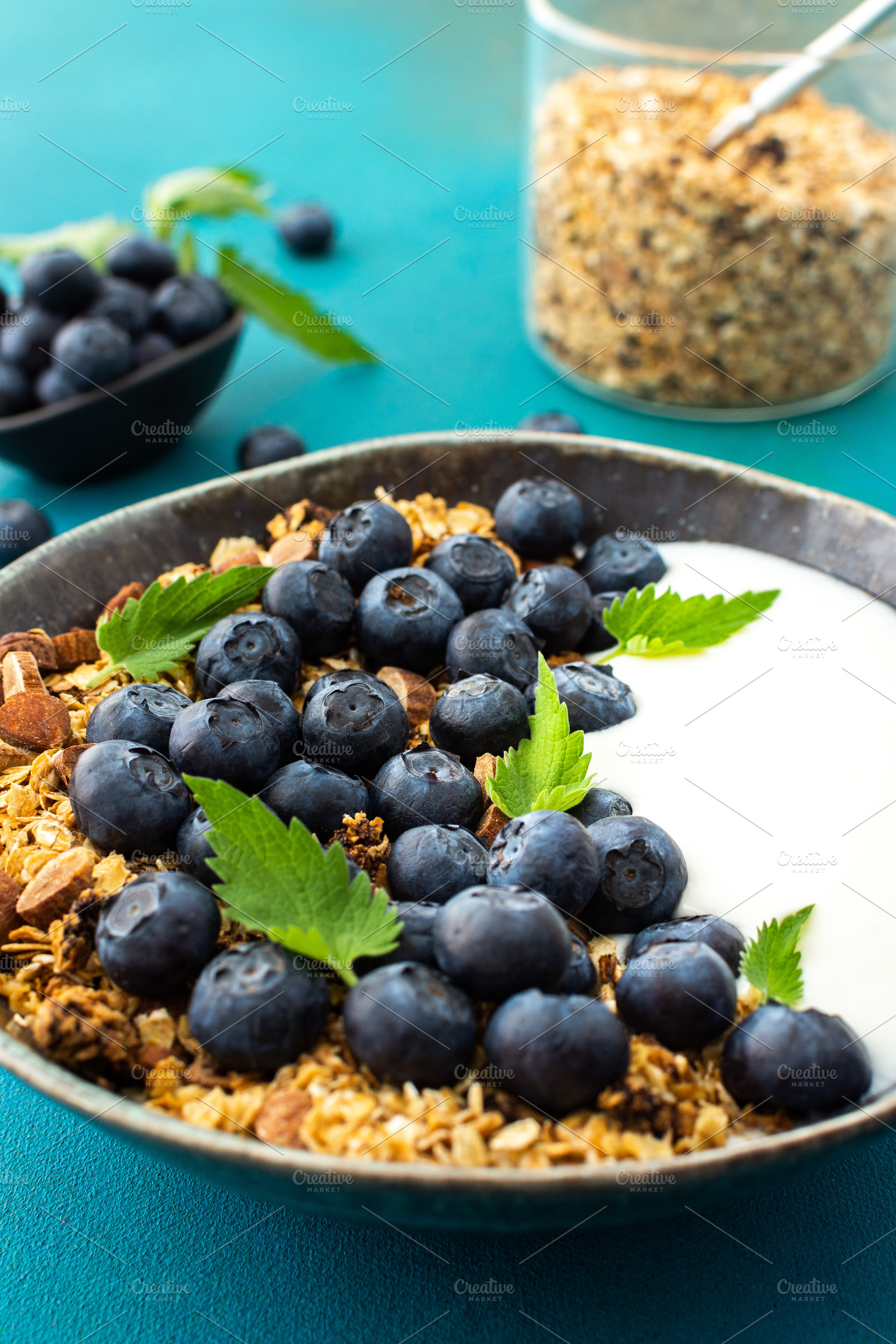 Granola with yogurt and blueberries, a Food & Drink Photo by Pandateam