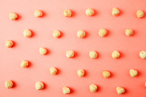 Nuts pattern - hazelnut on white bac