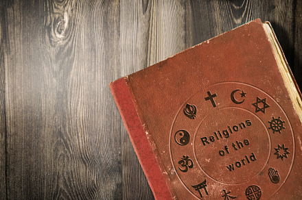 Science of world religions book on wooden table, a School & Education Photo by Davizro's Market