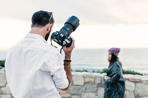 Photographer stock photo containing photographer and model