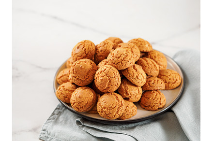 Plate of cookie amaretti on white, a Food & Drink Photo by Fascinadora