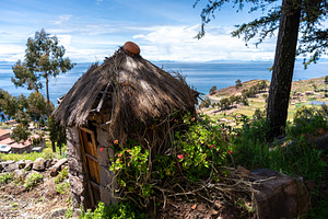 Traditional huts overlooking Lake Titicaca on Taquile Island, Pe, a Nature Photo by GoodGoods