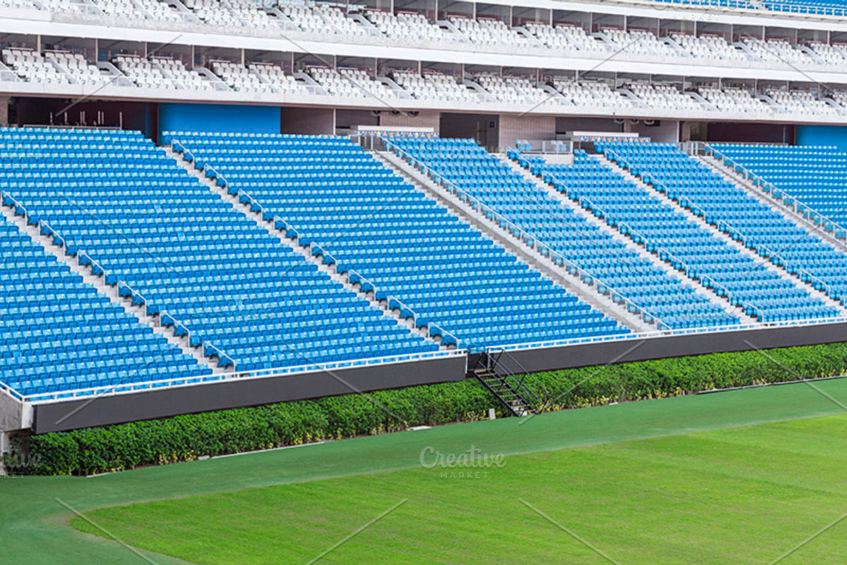 Large football stadium featuring seat, seating, and stadium, an ...