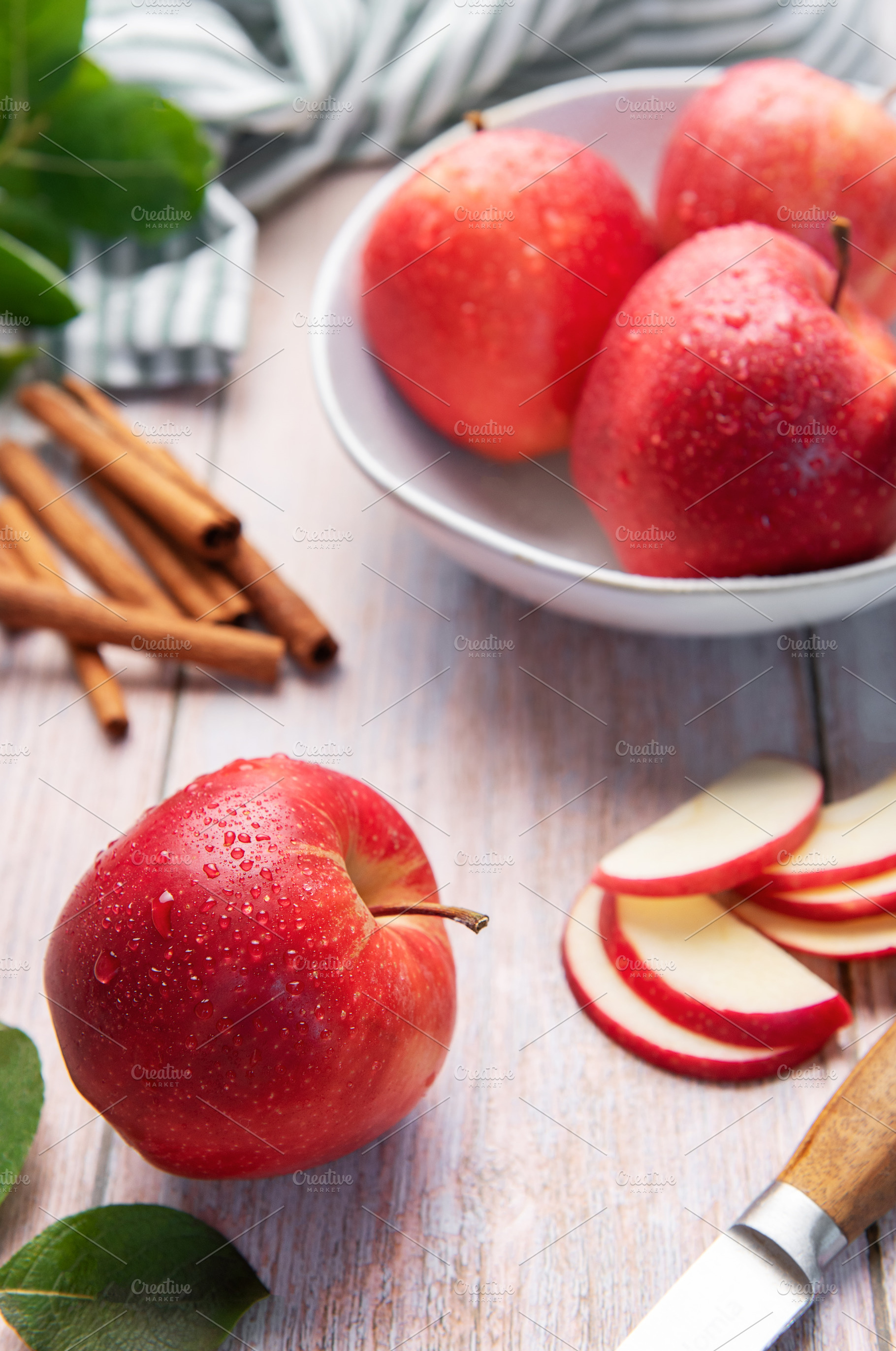 Fresh apples and cinnamon preparing for baking, a Food & Drink Photo by Olena Rudo