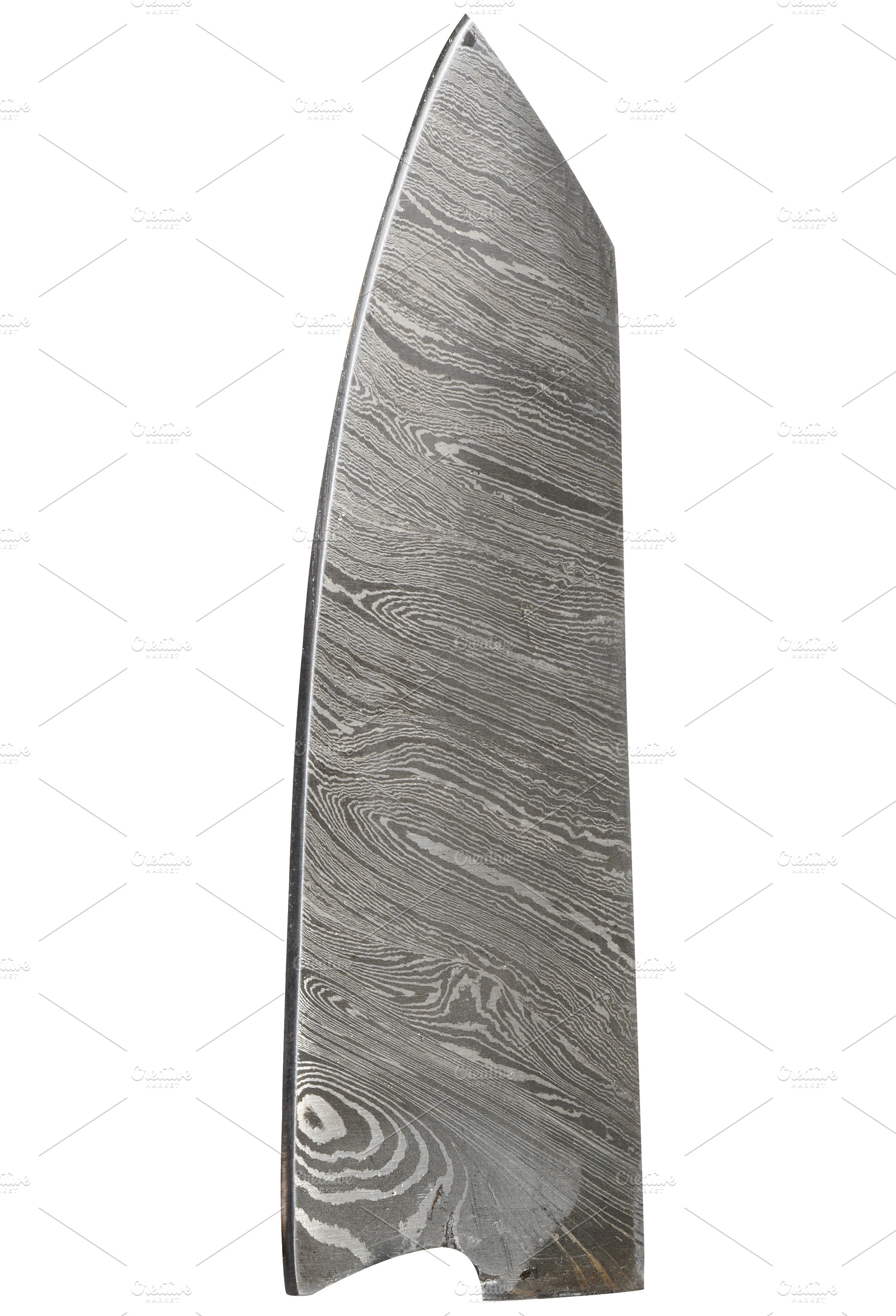 Damascus steel knife blade on isolated background, an Industrial Photo by ndanko