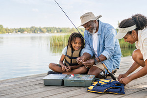 Family fishing trip on lakeside dock, a Photo by Dvoevnore photos