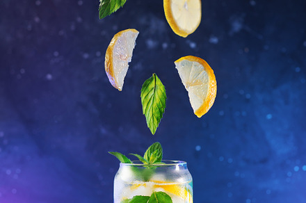 Refreshing lemonade with lemon and mint or lemon mojito, cold cocktail and levi, a Food & Drink Photo by PavelKant