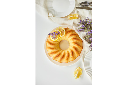Top view of lemon cake on white, a Food & Drink Photo by IlliaBondarPhotography