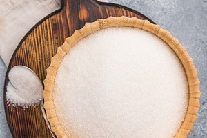 Versatile white sugar in a rustic bowl, ready to enhance dessert, a Food & Drink Photo by composter-box@mail.ru