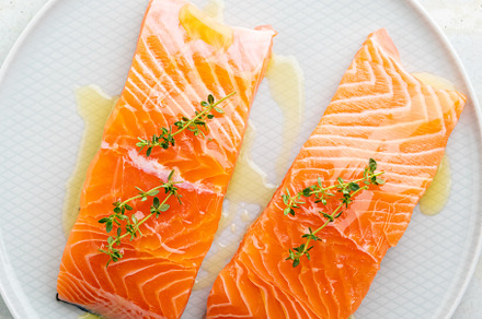 Fresh salmon fillet on a plate for delicious salmon steak.