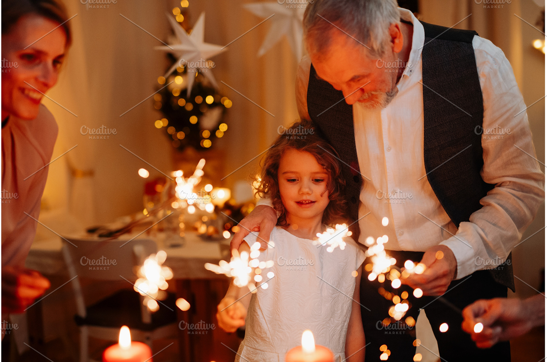 Grandparents and granddaughter, a Holiday Photo by HalfPoint