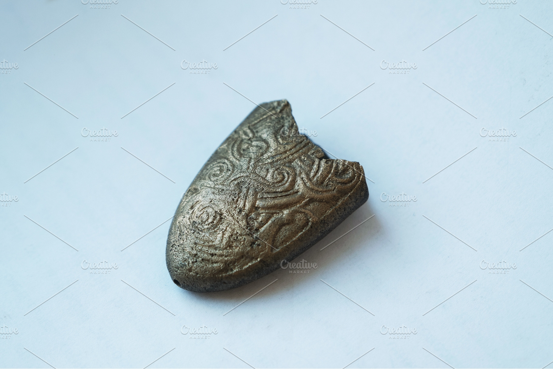 Ancient bronze belt chape fragment, an Architecture Photo by Rohan Photography