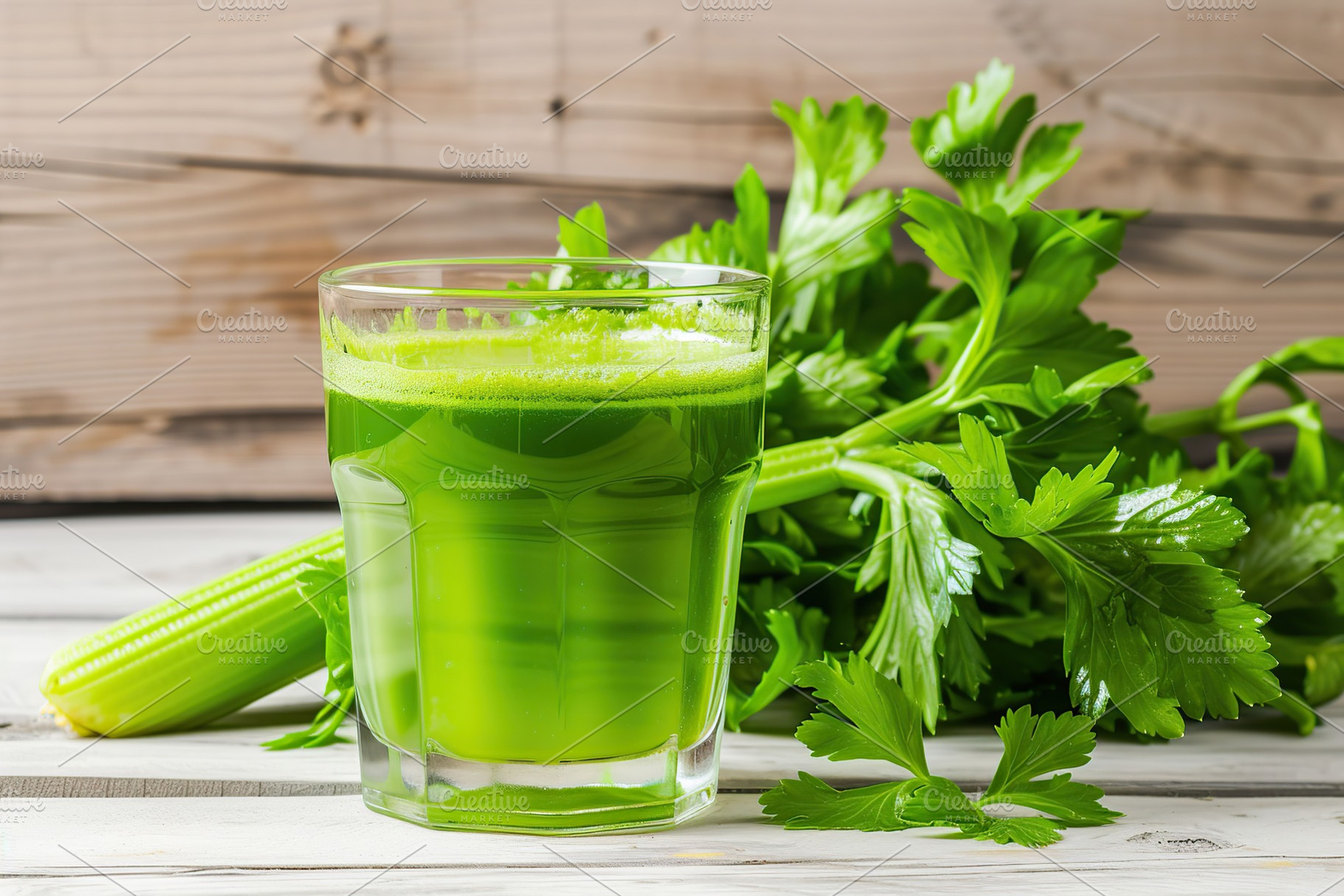 Fresh celery juice in glass on wooden table, a Food & Drink Photo by AlyaAnd