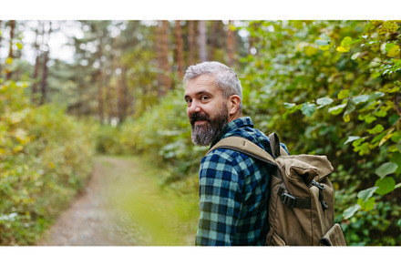 Handsome man standing in the middle, a Sports & Recreation Photo by HalfPoint