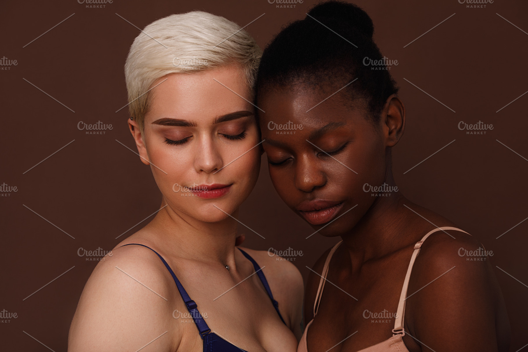 Two young women in lingerie standing, a Person Photo by Artem Varnitsin