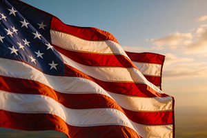 American Flag Waving Against Sky
