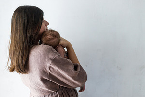 Happy Mother holding cute little baby close up. Happy Mothers da, a Person Photo by Sonjachni