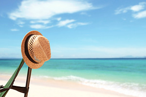 Tropical beach with straw hat, a Nature Photo by BOOCYS