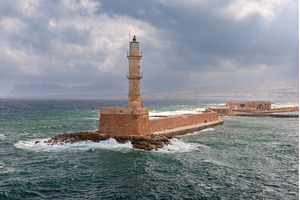 Lighthouse in Chania harbor, Crete, an Architecture Photo by kavalenkava