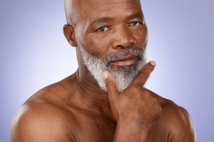 Skincare, beauty and senior portrait of model satisfied with anti aging routine, healthcare and natural cosmetics. Dermatology, spa salon and face of elderly black man happy with facial healthcare, a Photo by Peopleimages.com