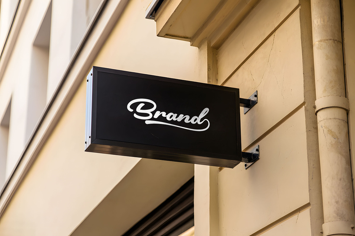 Logo Mockup Black Hanging Sign, a Mockup by GenesisCreativeCo (Photo 2 of 3)