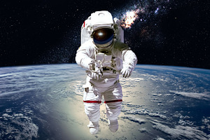 Astronaut in outer space featuring earth, planet, and cosmos