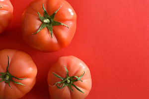 Fresh Tomatoes on Red Background Flat Lay, a Food & Drink Photo by Davizro's Market