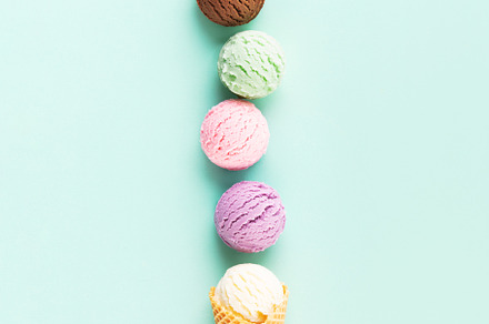 Flying ice cream balls on pastel light blue background, a Food & Drink Photo by Natalia Klenova's Shop