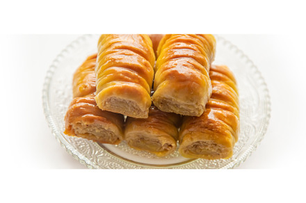 Oriental sweet baklava isolate on a, a Food & Drink Photo by yanadjana