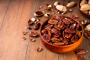 Pecans, peeled and shelled, whole and crushed, a Food & Drink Photo by Rimma