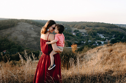 Joy in the mountains containing son, young, and mother