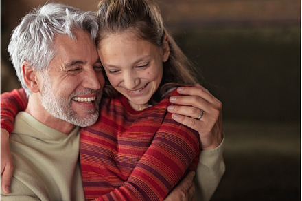 Portrait of teenage daughter hugging, a Person Photo by HalfPoint