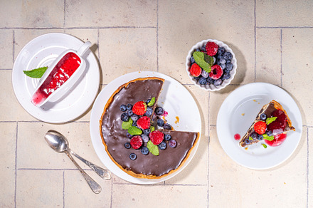 Homemade cheesecake with chocolate and berry, a Food & Drink Photo by Rimma
