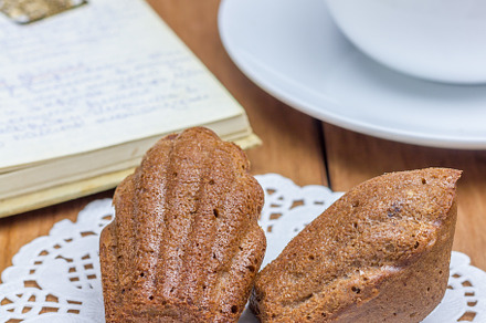 Homemade chocolate madeleines with a cup of coffee, a Food & Drink Photo by iuliia_n