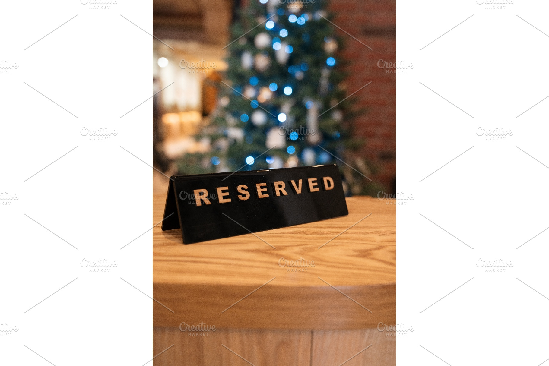 Reserved table sign in festive, a Food & Drink Photo by Jan Jack Russo Media
